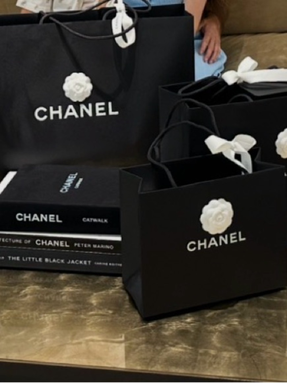 CHANEL Black Shopping Bags with White Camellia Accents